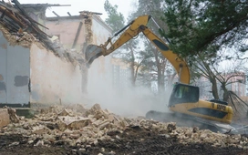 Controlled demolition process in Dallas with dust suppression by Best Dallas Demolition